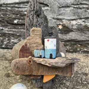 Unique handmade driftwood plaque. 
Little house &Lighthouse